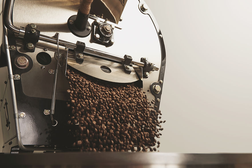 many-hot-freshly-baked-coffee-beans-fall-from-best-professional-large-coffee-roaster.jpg