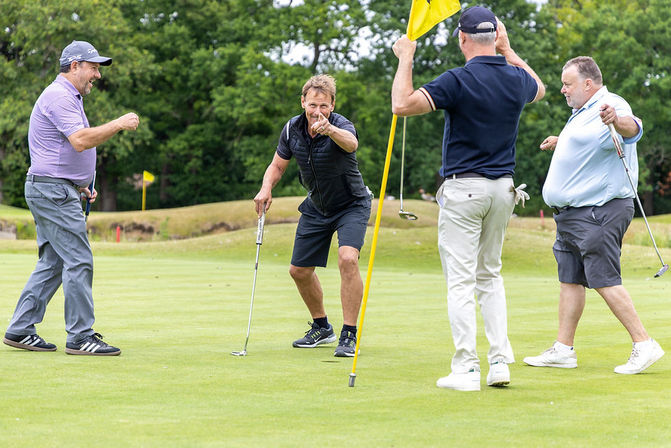 Teddy Sheringham celebrating an Eagle on the 12th.
