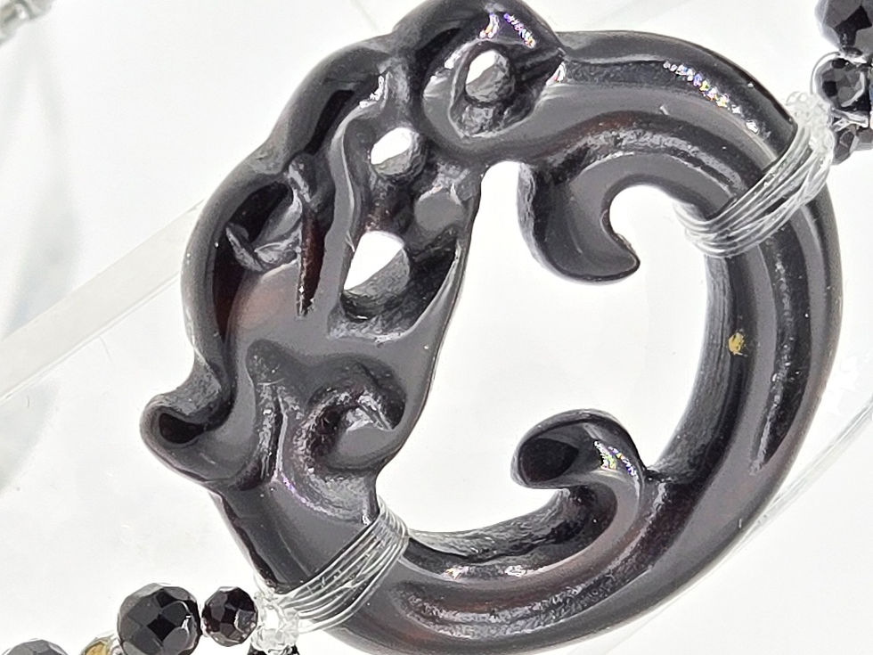 Thumbnail: Vintage carved dragon of onyx on a slider bracelet with Onyx