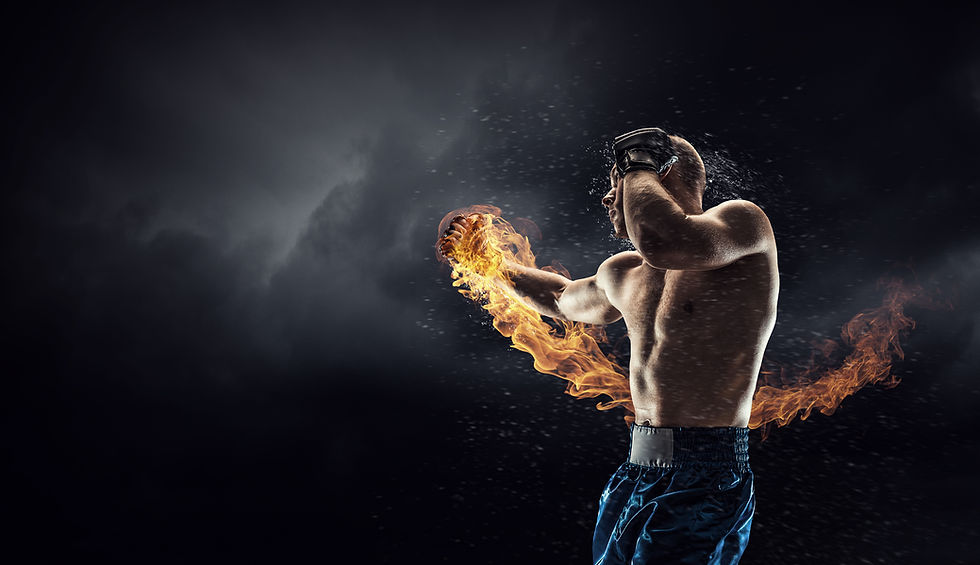 Boxer throwing a fiery punch in dark, cloudy setting. Flames trail his clenched fist as water droplets scatter, highlighting action.