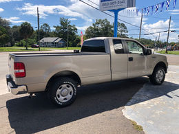 Gold Ford F150 single cab, long bed