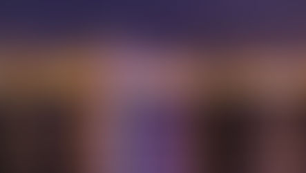 Liverpool waterfront at night time, many bright lights of the city can be seen