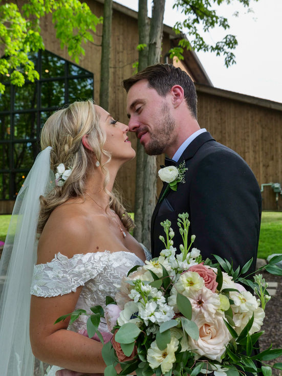 Oakland County wedding photography capturing beautiful moments of bride, groom, and outdoor ceremonies. Expert service with s