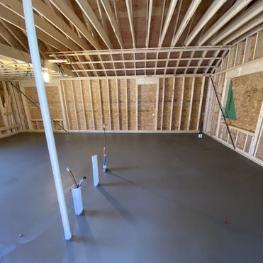 New concrete floor in a garage under construction