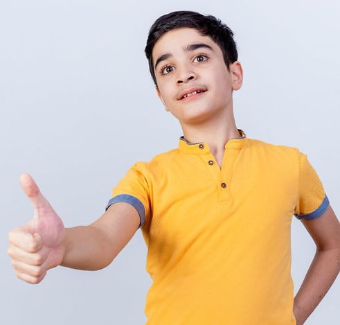 Young dental patient smiling at the dentist.jpg