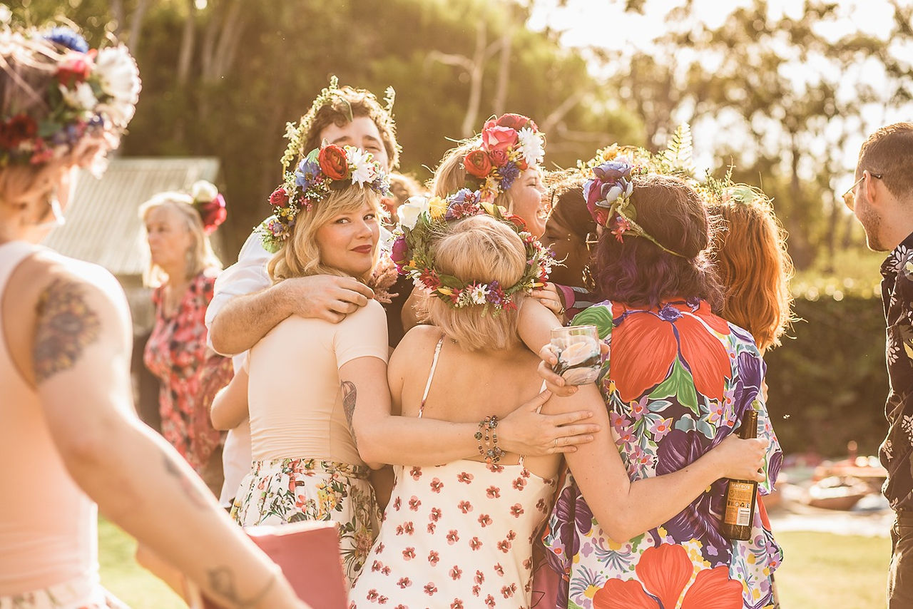 Garden wedding big group hug flower crowns