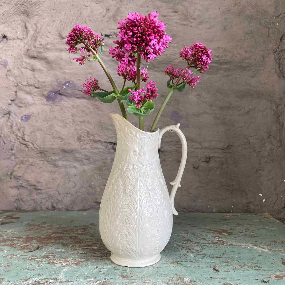 White bisque pottery jug - ferns