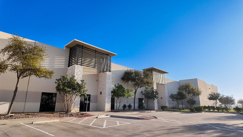 A modern tilt-up warehouse completed by Dominion Construction, a trusted general contractor in commercial construction and industrial building projects.
