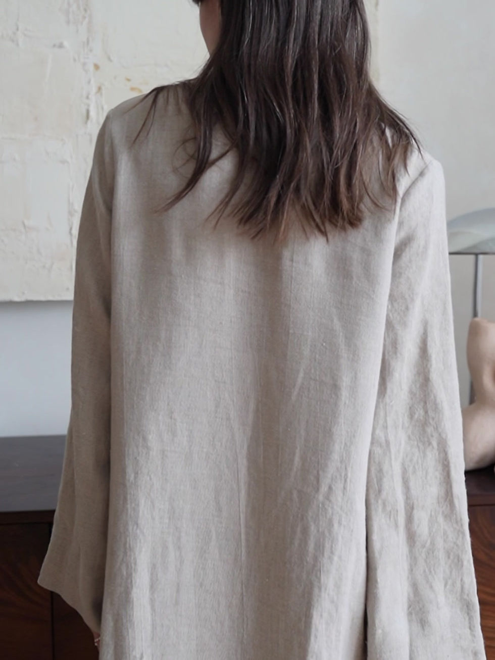 Thumbnail: Relaxed fit linen dress for fall with maxi-length, long wide sleeves, and deep scoop neckline