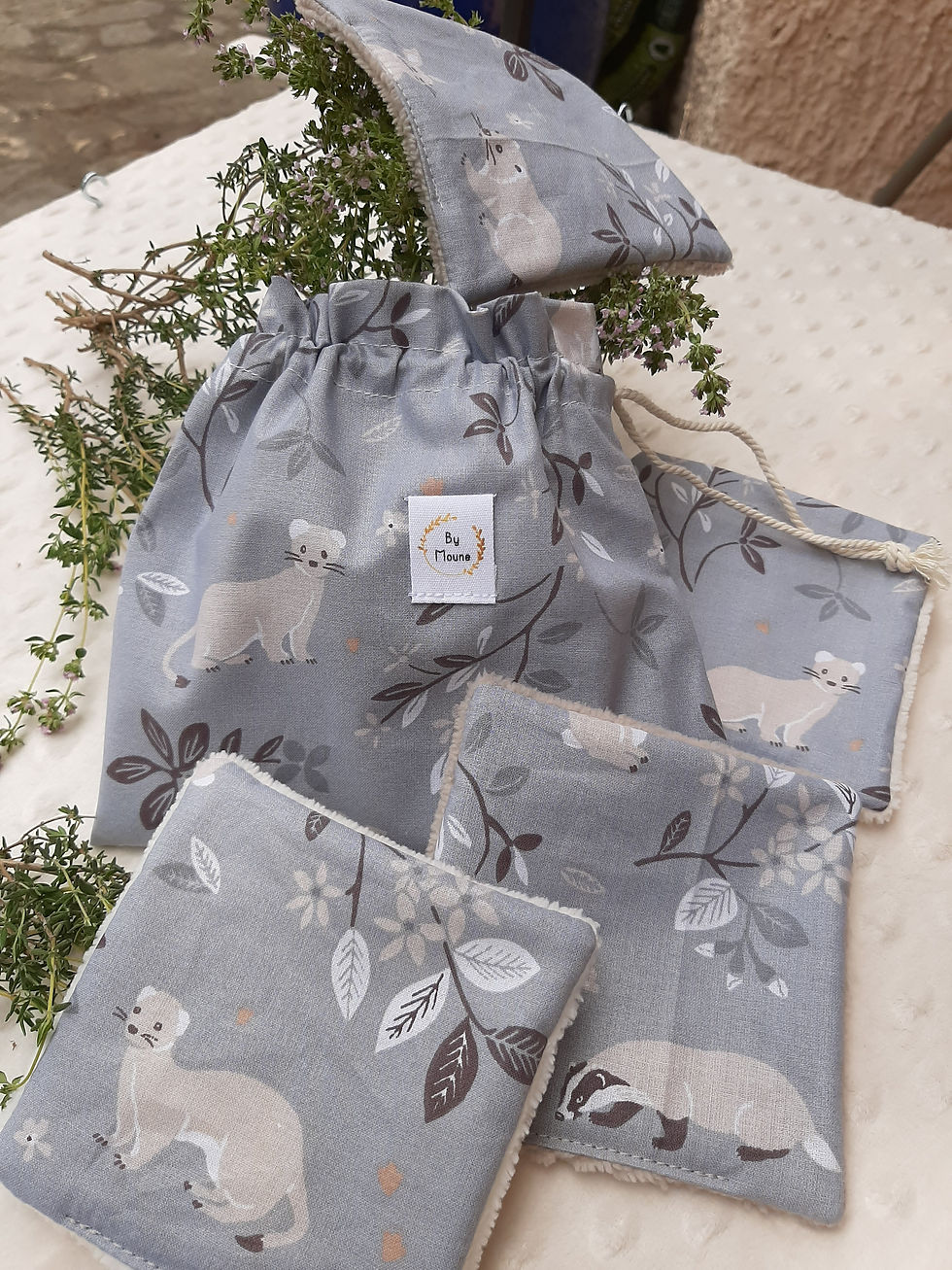 Miniature : Pochon avec 4 lingettes assorties