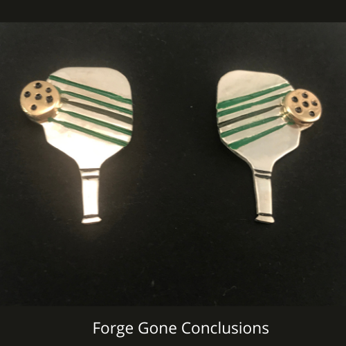 Sterling Silver Pickleball Earrings closeup on black background