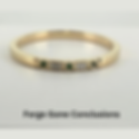 Wedding Band with Emeralds and Diamonds on white background