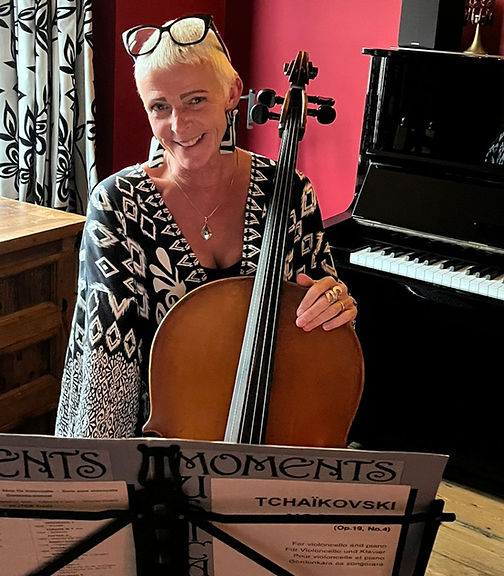 Susie with Cello in music room