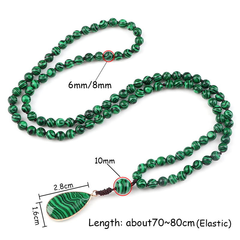 Malachite teardrop pendant detail with gold-tone accent