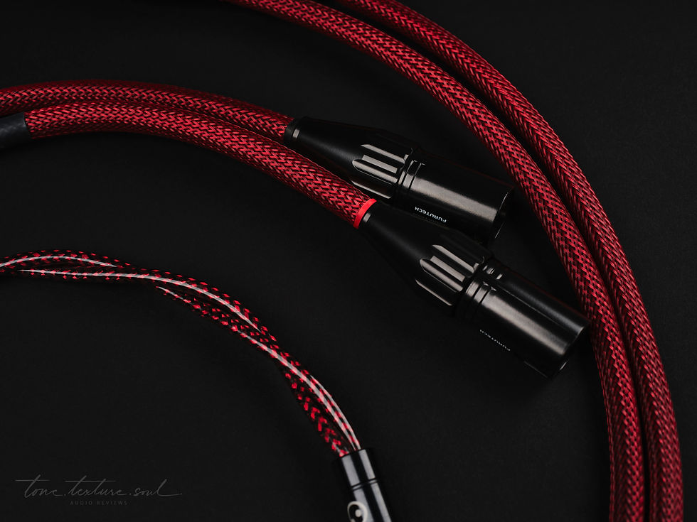Arctand Rubi² power cables and connectors arranged on black