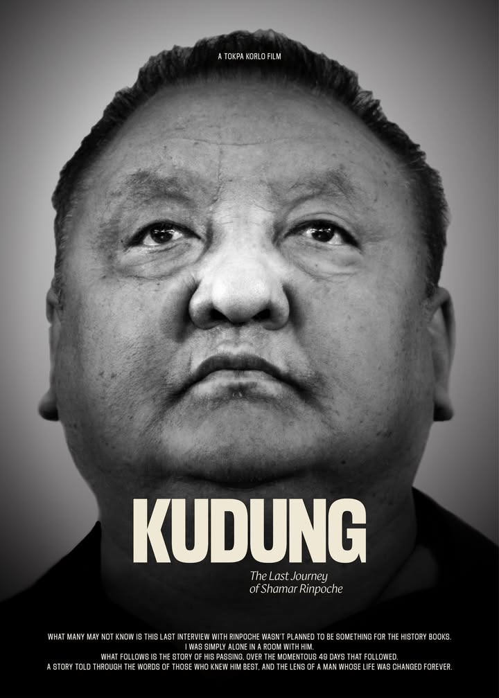 A monochrome film poster shows a close portrait looking upward above the title KUDUNG — New Delhi, India — Feb 28, 2023 — My dear friends, I am extremely excited to announce that my film, “Kudung - The Final Journey Of Shamar Rin... — New Delhi, India — February 2023 — Kudung - The Premiere — photograph by Tokpa Korlo