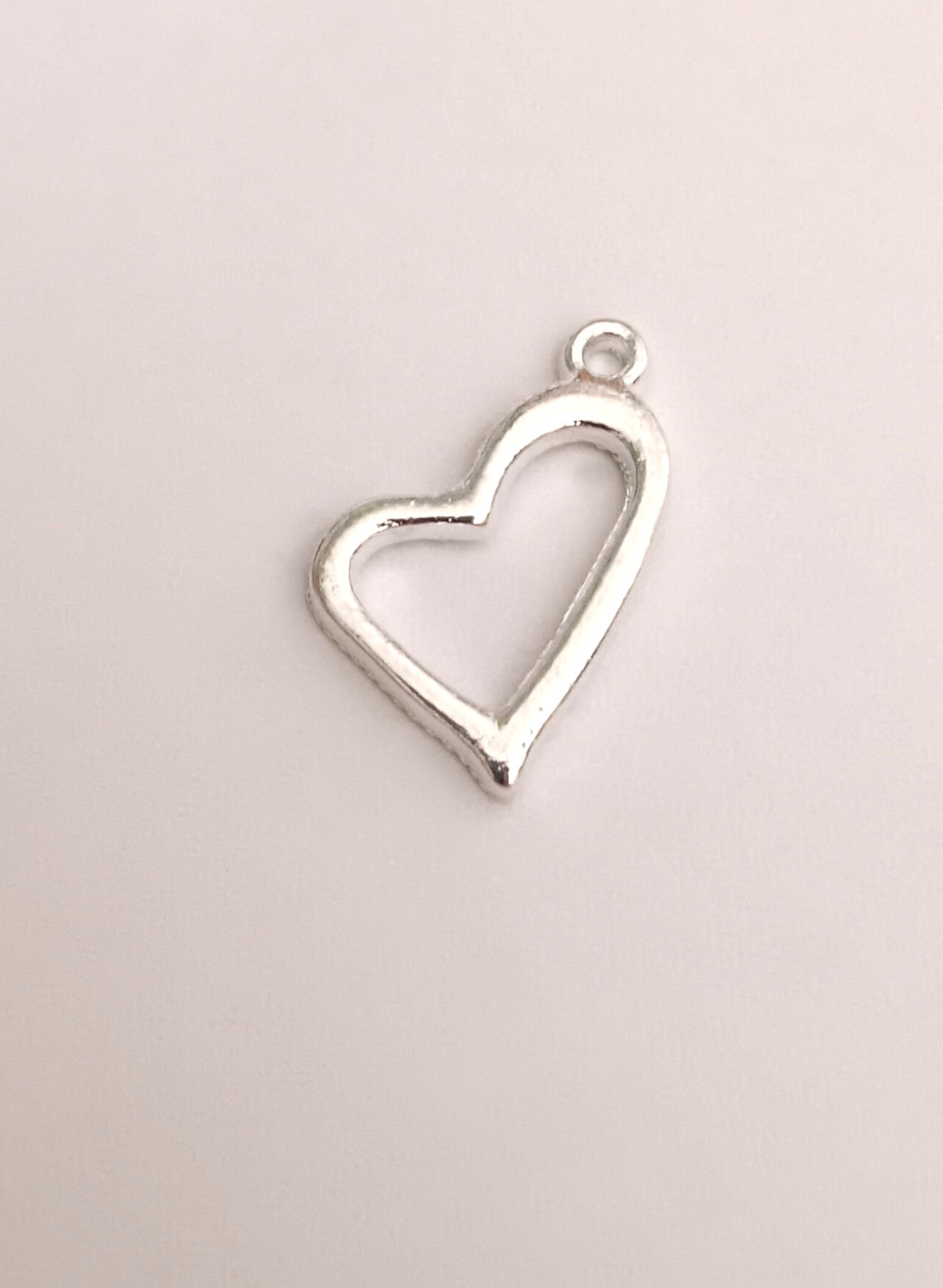 7 for €1-Long Silver Heart Charm