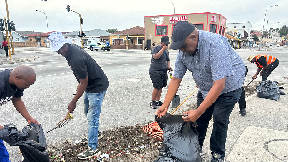 Volunteers on community missions cleaning up street litter