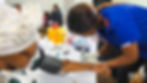 Healthcare missions: nurse checking woman's blood pressure