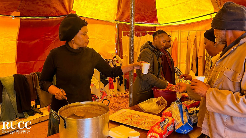 Volunteers serving food during community outreach missions.
