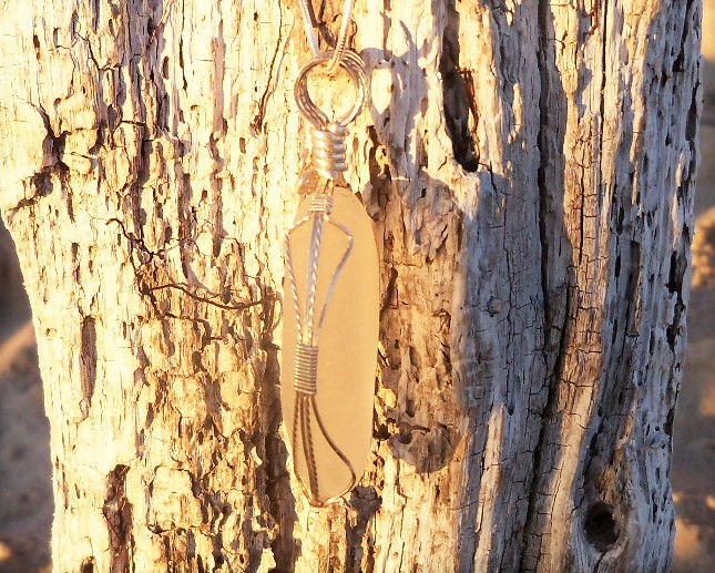 Thumbnail: white beach glass side view