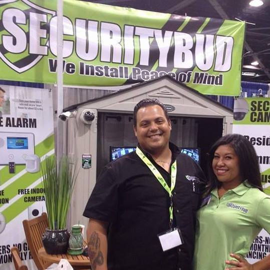 Securitybud team at trade show showcasing commercial security systems