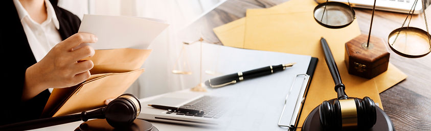 business-lawyers-discussing-contract-papers-with-brass-scale-desk-office-law-legal-service