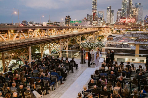 a view of the NYC skyline from a co-officiated wedding in New York City, New York