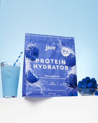 Jive Blue Raspberry protein drink on bold blue background.