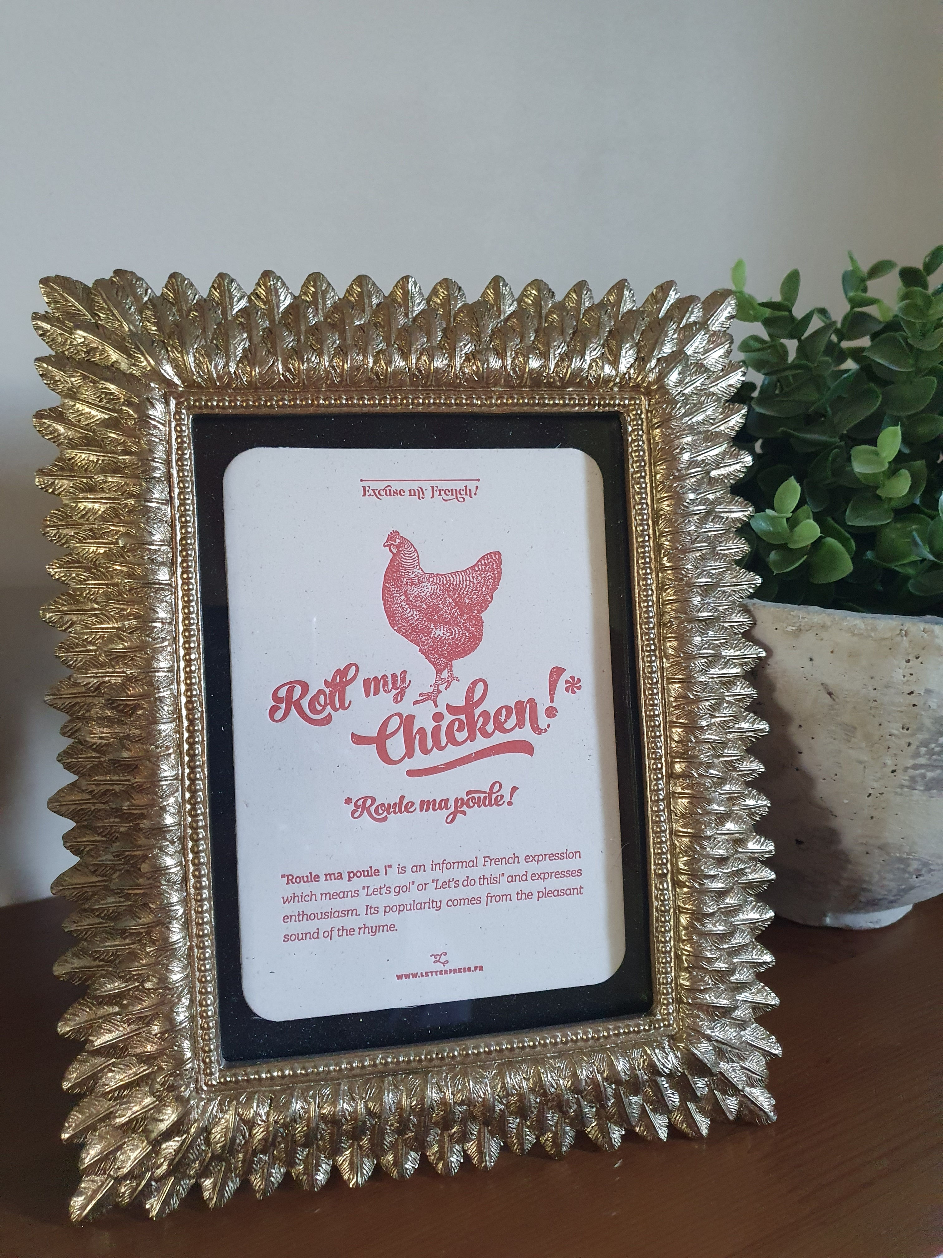 Gold framed art with text