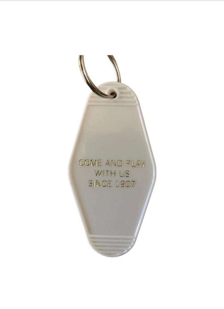 Thumbnail: The white block letter and gold shining inspired Overlook Hotel key tag