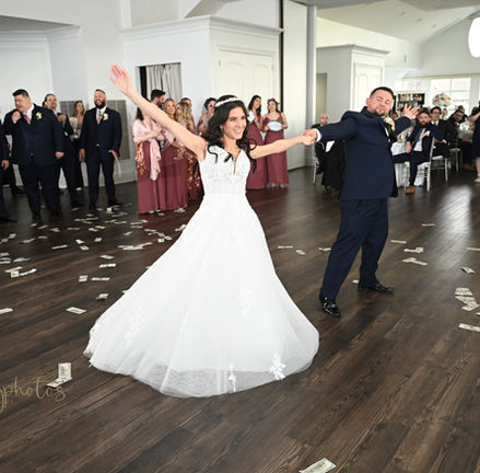 Bride and groom finishing their first dance at their wedding at Granite Links in Quincy MA