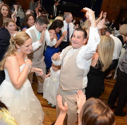 The dance floor is hopping and guests are having a great time at Camp Kiwanee in Hanson MA
