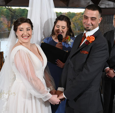 Bride and groom turn to see their guests and thank them for the love and support at their wedding ceremony at Camp Kiwanee Hanson MA
