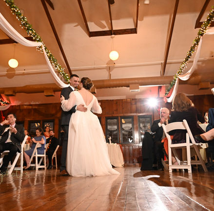 Bride and groom in the center of their dance floor during their wedding at Camp Kiwanee in Hanson MA
