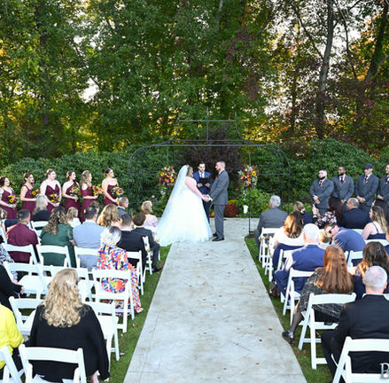 Outdoor ceremony in the fall foliage at Avenir in Walpole MA