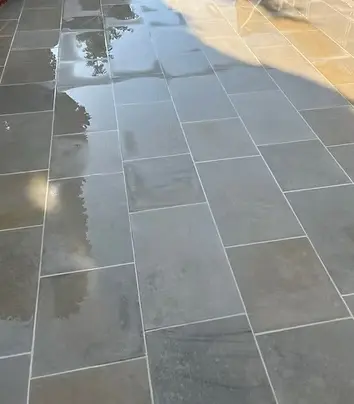 Natural stone patio restored by CR Cleaning Kent