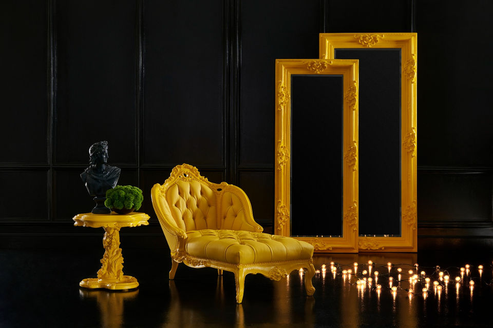 Yellow chaise on candlelight setting