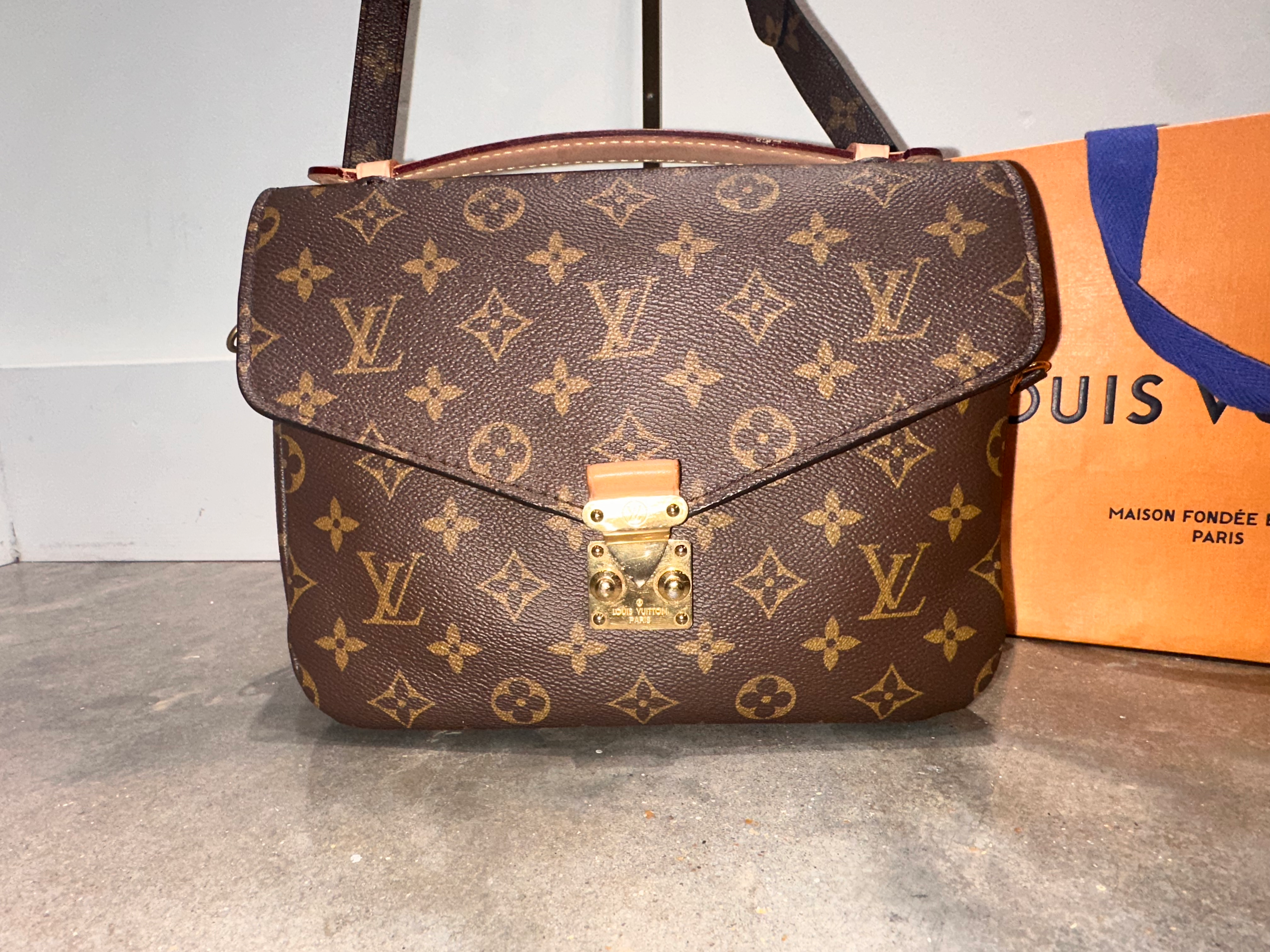Pochette Métis monogram