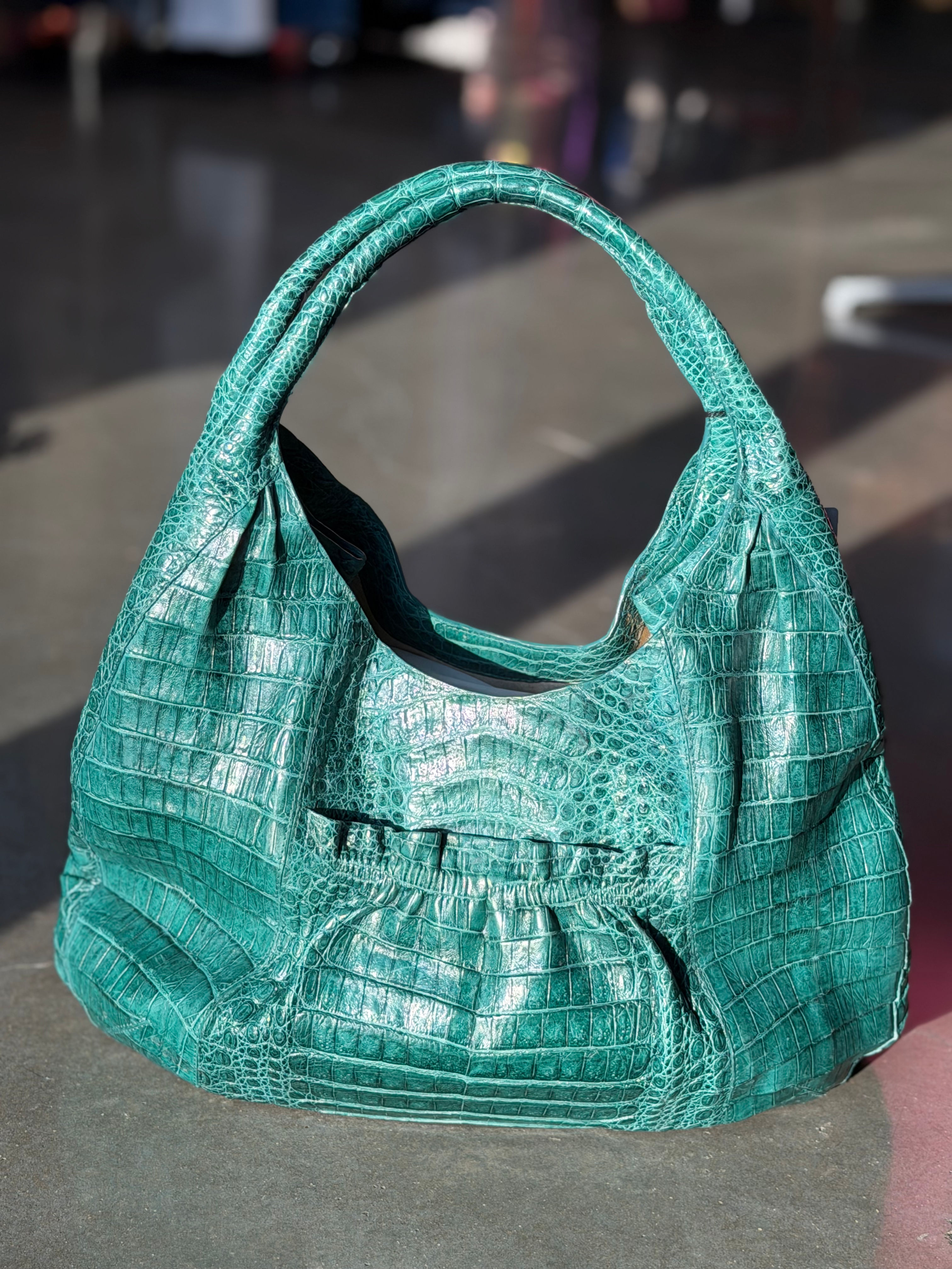 Nancy Gonzalez caiman hobo