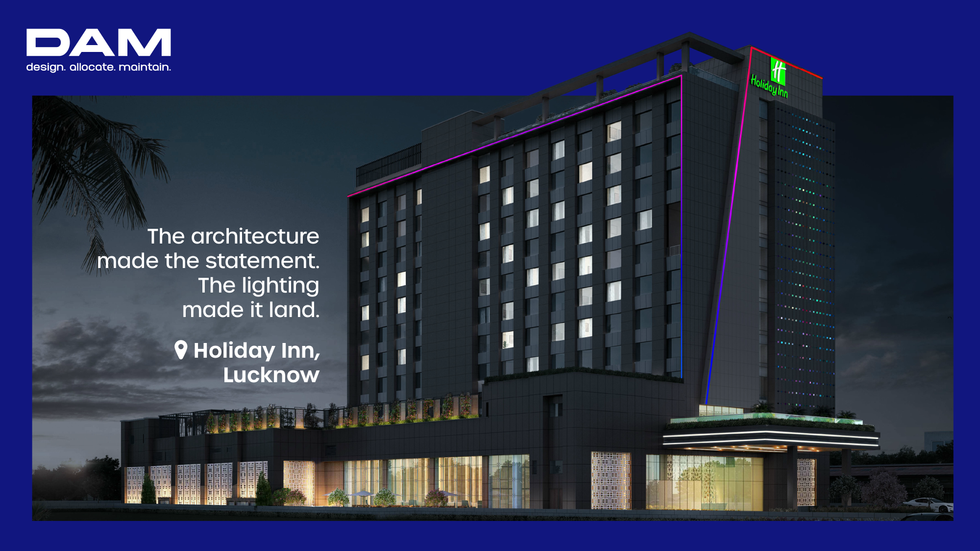 Night view of Holiday Inn Lucknow featuring facade lighting design by DAM Solutions, with highlighted lighting lines illustrating how architectural lighting enhances the building's composition and visual hierarchy.