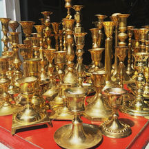 Gold, brass candleholders