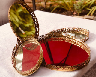 Oval mirrored trays with gold filigree edges - $8