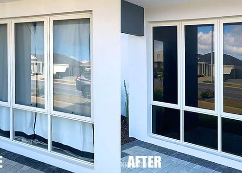 Living room with residential window tint reducing glare and heat