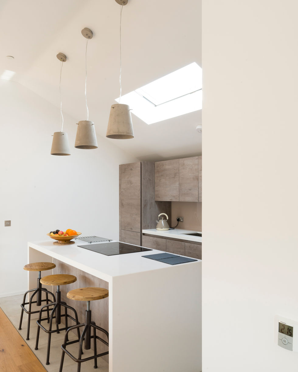 Contemporary sustainable kitchen at first floor level of the hidden eco house.