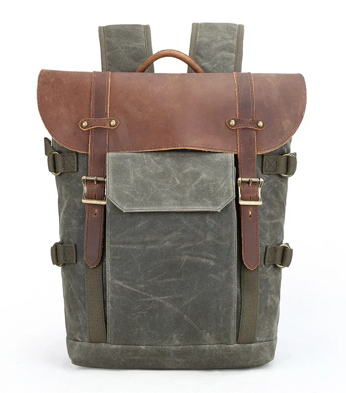 Canvas Camera Backpack - A durable and spacious backpack designed to carry your camera and accessories in style and comfort, perfect for photographers on the go.