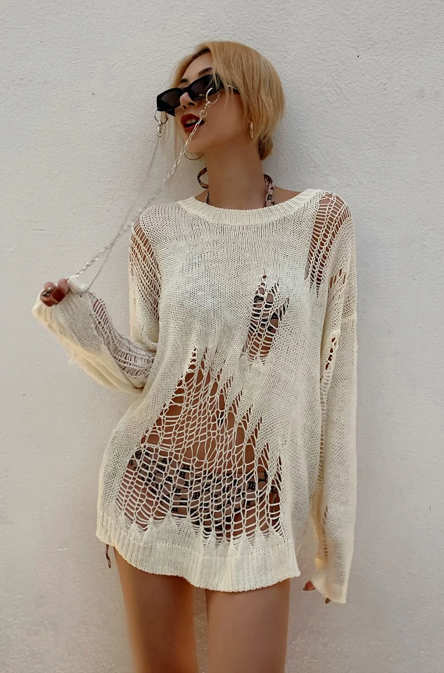 Stay cozy in style with our Loose Knitted Long Sleeve Oversized Pullover. Perfect for chilly evenings or casual outings. Shop now for comfort and elegance!