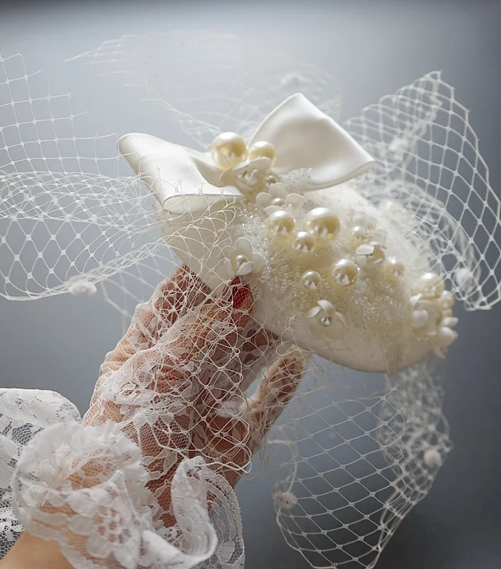 Parisian Elegance Pearl Hat with Bow - Add a Touch of Sophistication to Your Look