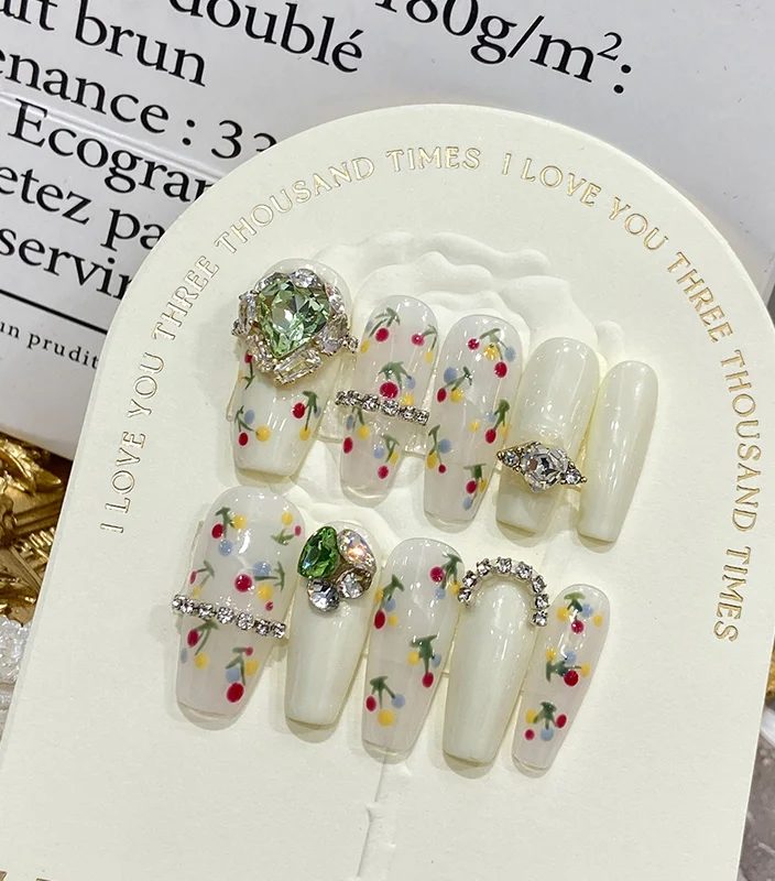 Indulge in the sweet allure of cherries with this captivating nail set, adding a touch of fruity charm and glamour to your overall style