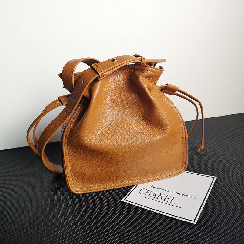 Thumbnail: The Pastoral Sovereign – Cowhide Pull-belt Bucket Bag